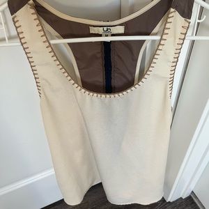 Cream tank top with cute design on the back!